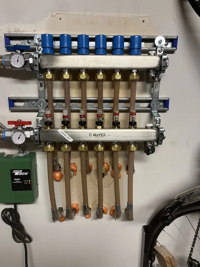 Plumber performing Water Heater Repair at a residential property in Cut Off